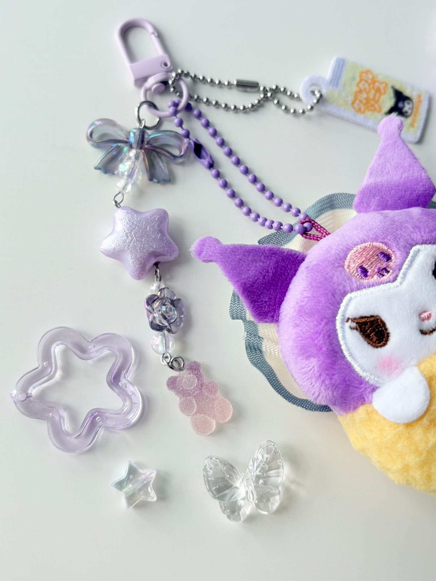 Snuggly Kuromi Plushie Keychainn