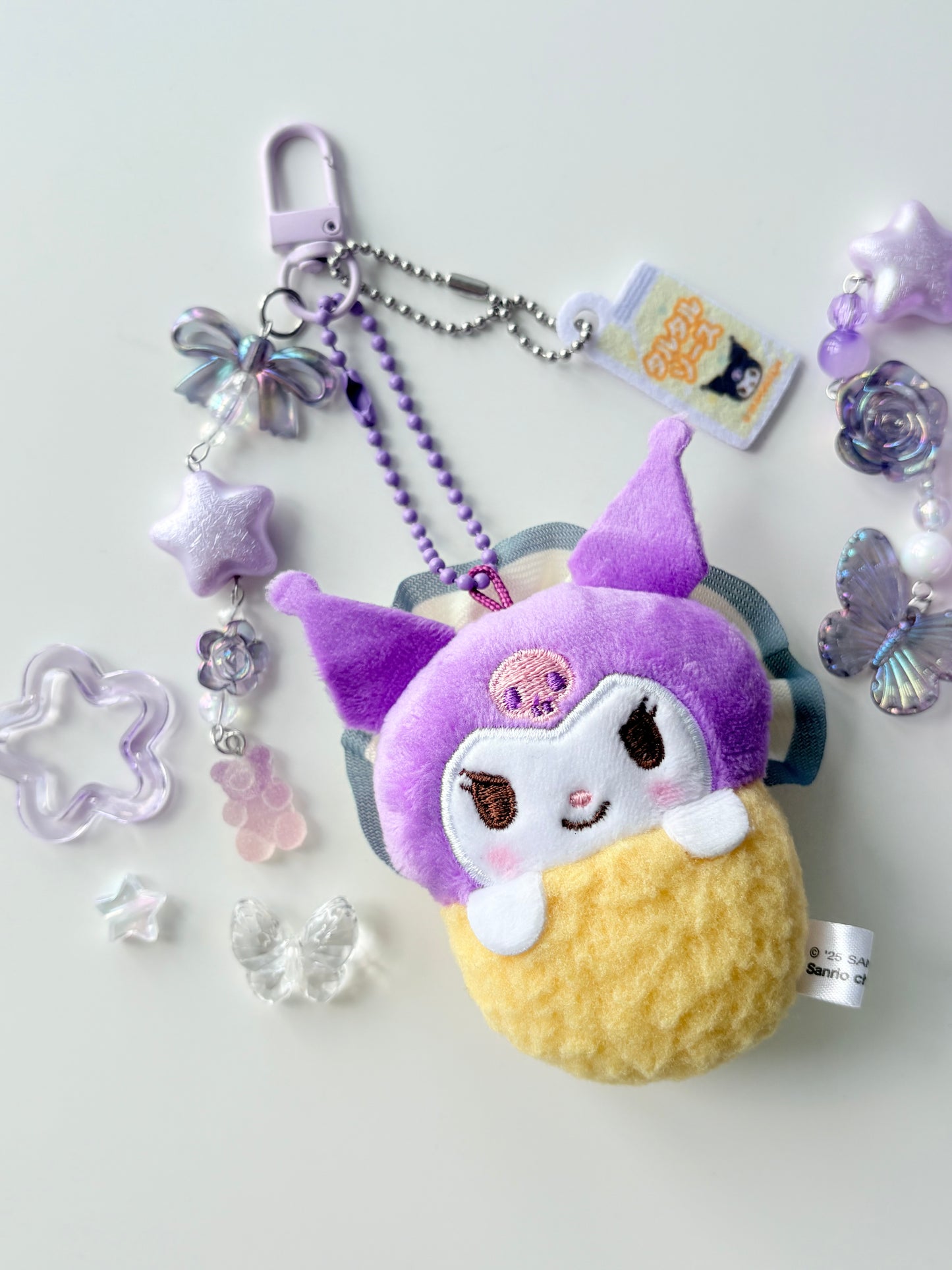 Snuggly Kuromi Plushie Keychainn